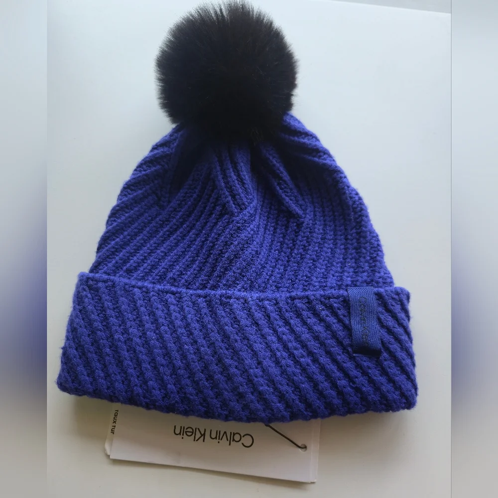 Calving Klein faux- fur Pompom Beanie NWT